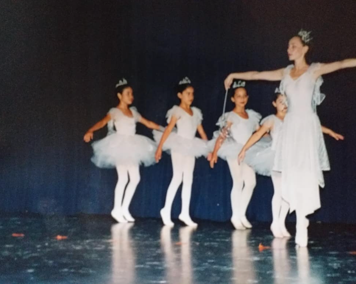 Old Photograph of a Ballet show featuring Andrea dancing ballet as a child